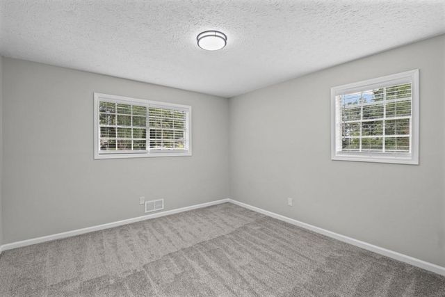 1050 Castlewood Drive, Woodstock, GA 30189