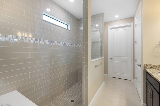 7700 Winding Cypress DR, Naples, FL 34114