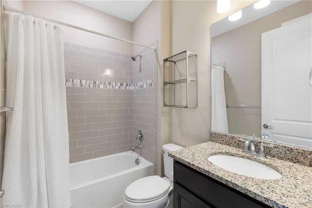 7700 Winding Cypress DR, Naples, FL 34114