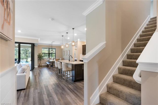 7700 Winding Cypress DR, Naples, FL 34114