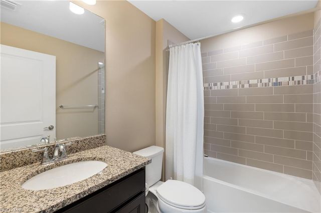 7700 Winding Cypress DR, Naples, FL 34114