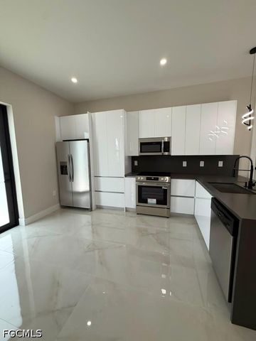 932 Dempsey ST, Lehigh Acres, FL 33974