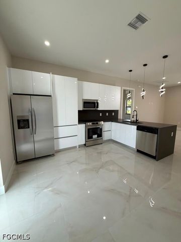 932 Dempsey ST, Lehigh Acres, FL 33974