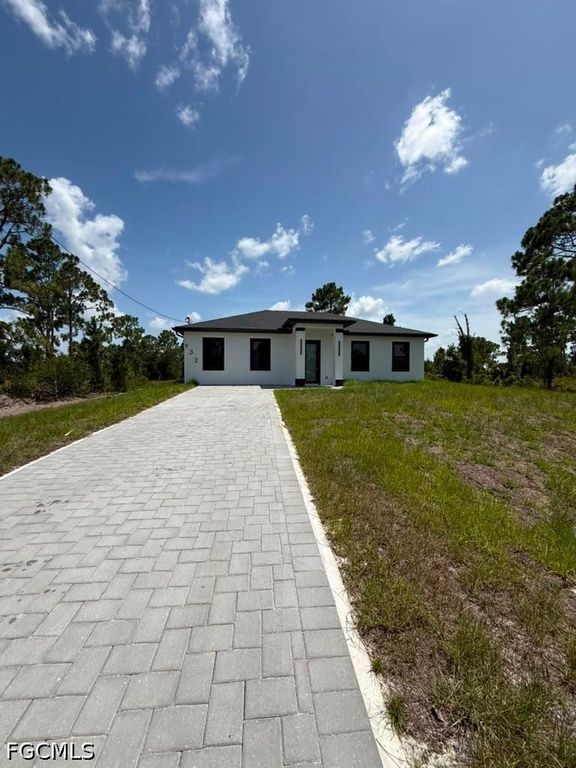 932 Dempsey ST, Lehigh Acres, FL 33974