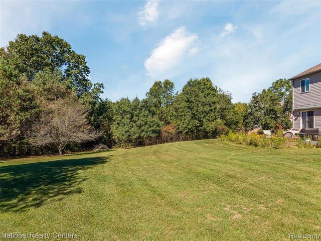 678 Joshua Drive, Highland, MI 48356
