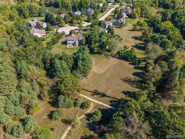 678 Joshua Drive, Highland, MI 48356