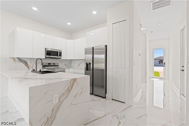 430 Petite AVE, Lehigh Acres, FL 33974