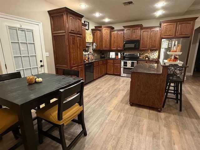4034 Bertie Ann Road, Moss Bluff, LA 70611