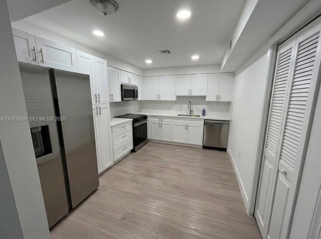 16500 Golf Club Road 104, Weston, FL 33326