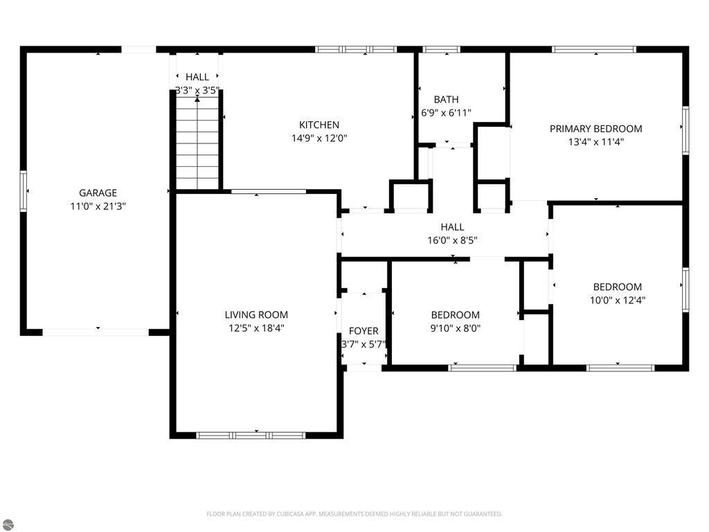 Floor plan of a 3-bedroom, 2-bath ranch home at 315 N Simons Street, Cadillac, MI, showing layout including garage, kitchen, living room, and bedrooms.
