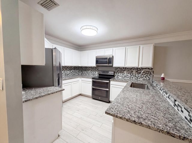 917 Imperial Lake Road, Lake Belvedere Estates, West Palm Beach, FL 33413