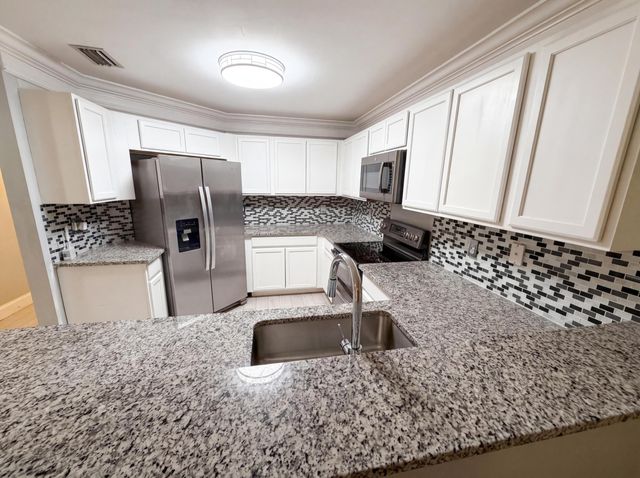 917 Imperial Lake Road, Lake Belvedere Estates, West Palm Beach, FL 33413