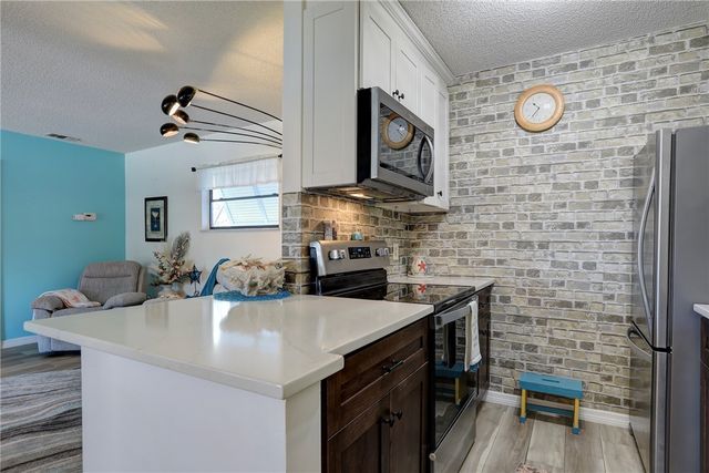 1116 Breezy Way 1H, Sebastian, FL 32958