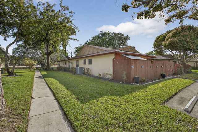 4296 Woodstock Drive D, West Palm Beach, FL 33409