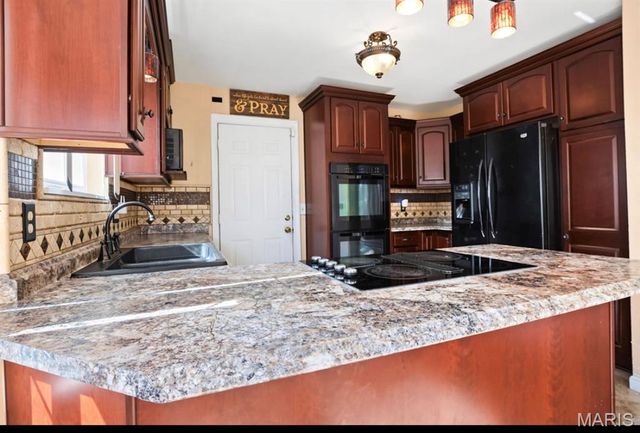 16309 Hampden Place, Florissant, MO 63034