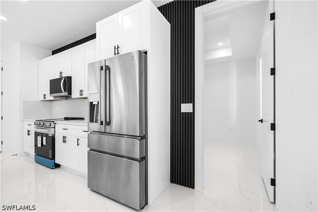 1113 Enrique ST E, Lehigh Acres, FL 33974