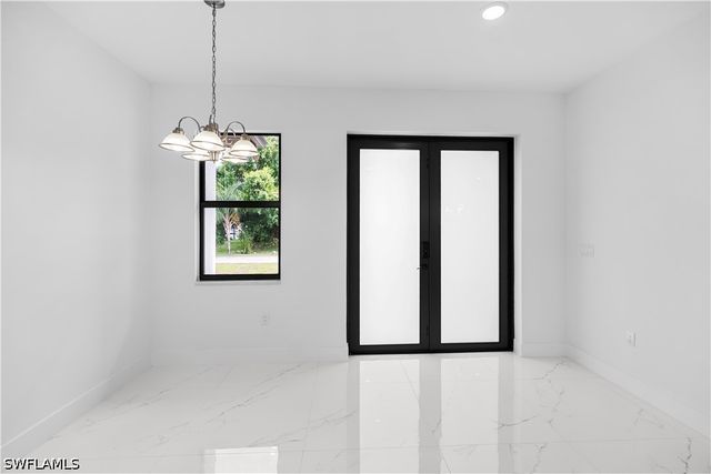 1113 Enrique ST E, Lehigh Acres, FL 33974