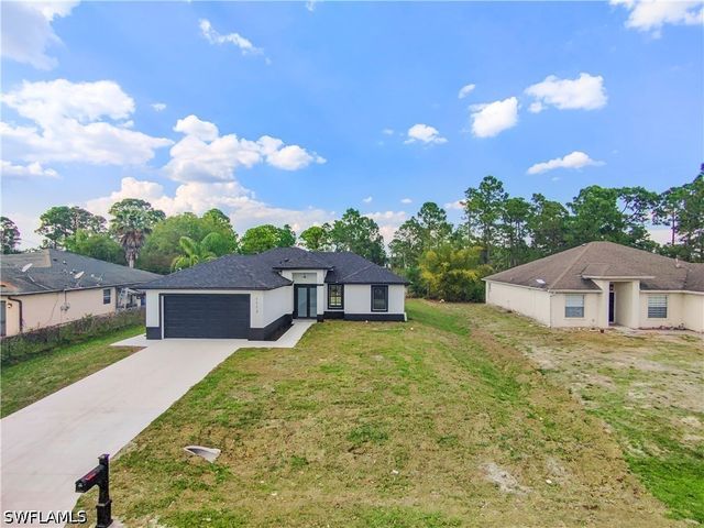 1113 Enrique ST E, Lehigh Acres, FL 33974