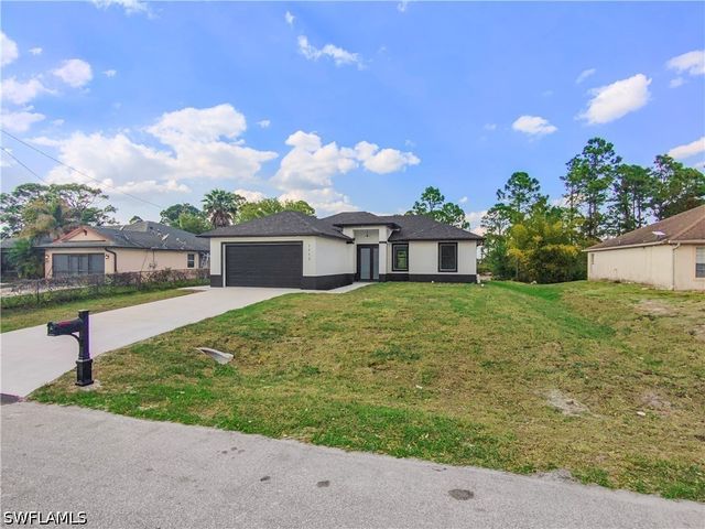 1113 Enrique ST E, Lehigh Acres, FL 33974