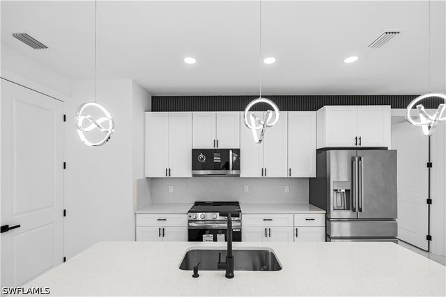 1113 Enrique ST E, Lehigh Acres, FL 33974