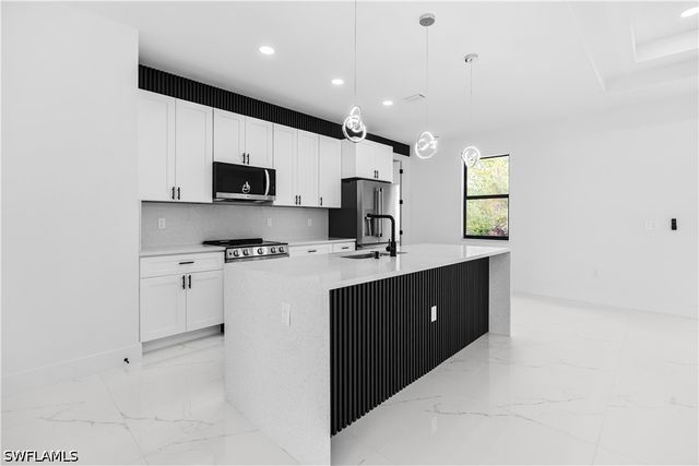 1113 Enrique ST E, Lehigh Acres, FL 33974