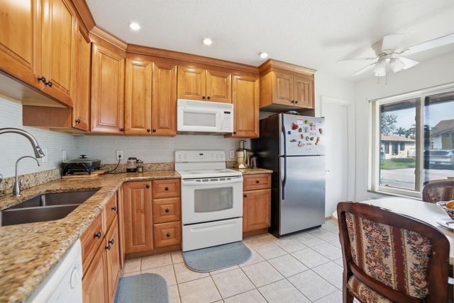 6335 Tall Cypress Circle, Greenacres, FL 33463