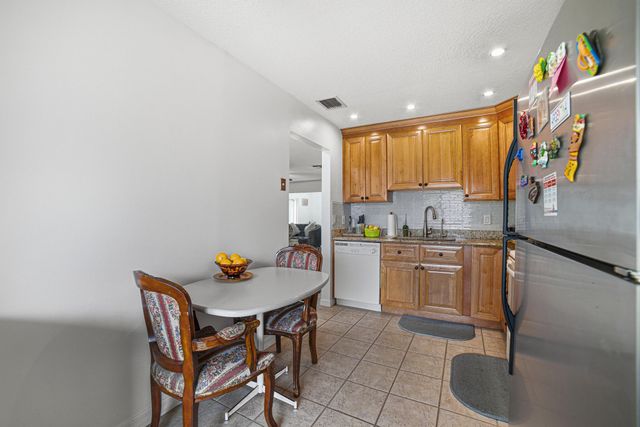 6335 Tall Cypress Circle, Greenacres, FL 33463