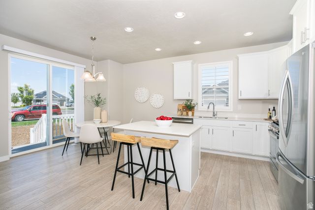2477 N HOODED CRANE CIR, Clinton, UT 84015
