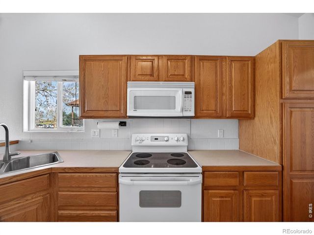 2460 Birdie Way, Milliken, CO 80543