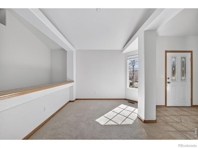 2460 Birdie Way, Milliken, CO 80543