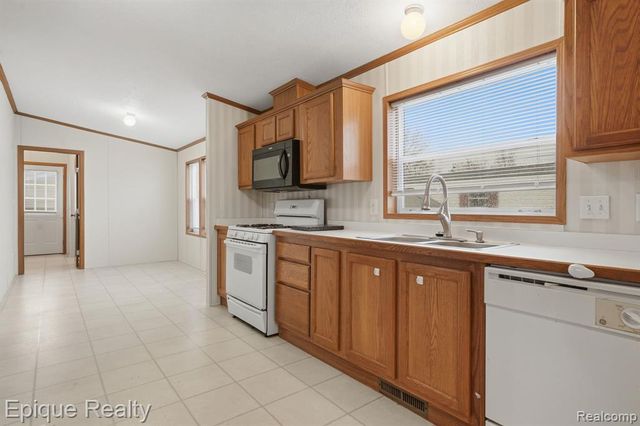 310 Greenwood, Wixom, MI 48393