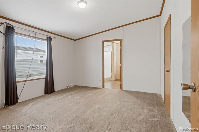 310 Greenwood, Wixom, MI 48393