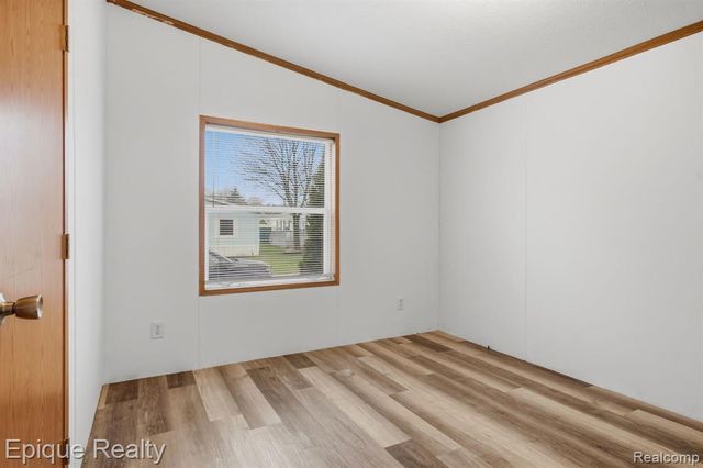 310 Greenwood, Wixom, MI 48393