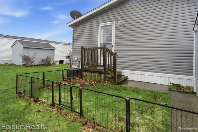310 Greenwood, Wixom, MI 48393