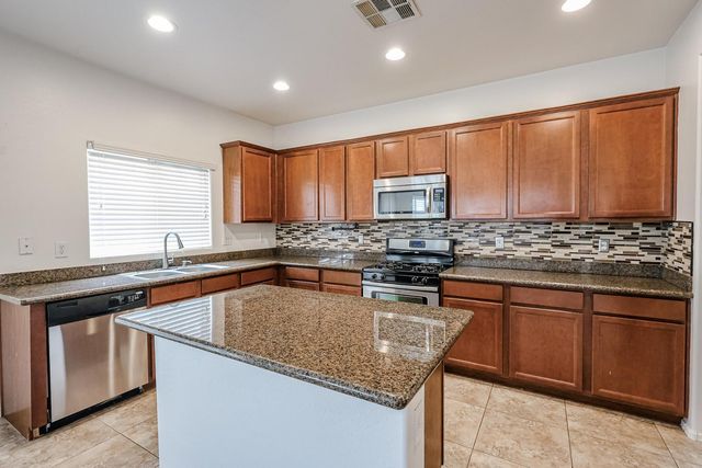 12039 W LEATHER Lane, Peoria, AZ 85383