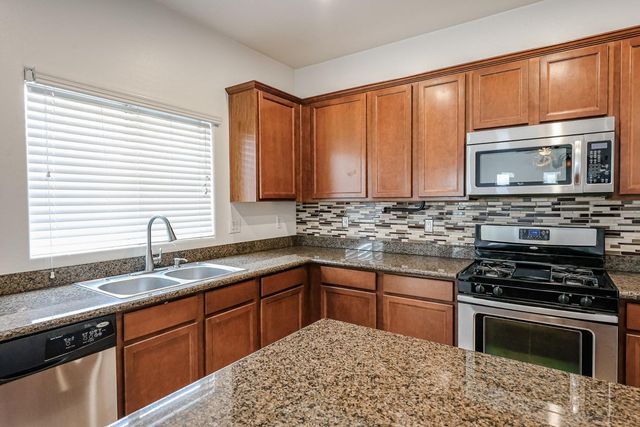 12039 W LEATHER Lane, Peoria, AZ 85383