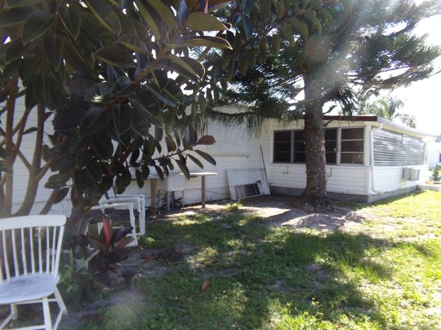 6385 Cypress Lane, Atlantis, FL 33462