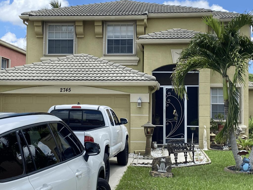 2745 Misty Oaks Circle, Royal Palm Beach, FL 33411