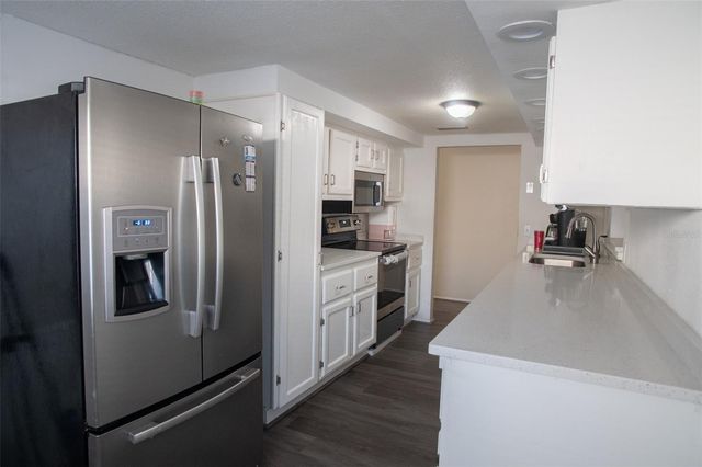 1153 TAMARAC DRIVE, Holiday, FL 34690