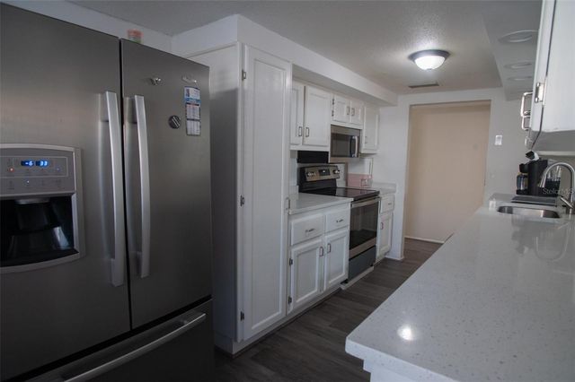 1153 TAMARAC DRIVE, Holiday, FL 34690