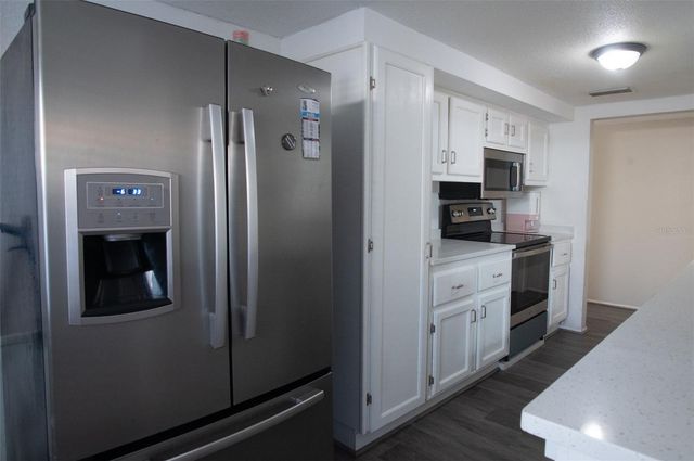 1153 TAMARAC DRIVE, Holiday, FL 34690