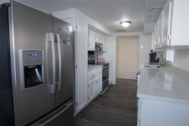 1153 TAMARAC DRIVE, Holiday, FL 34690