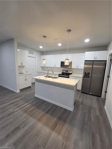 15 Hampton AVE, Lehigh Acres, FL 33936