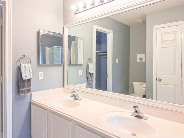 6 Scenic Brook Court, The Woodlands, TX 77382