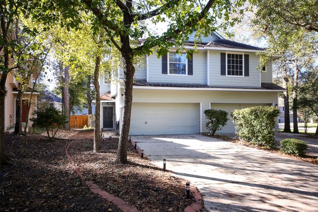6 Scenic Brook Court, The Woodlands, TX 77382