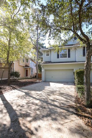 6 Scenic Brook Court, The Woodlands, TX 77382
