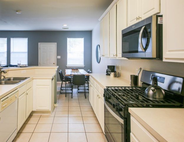 6 Scenic Brook Court, The Woodlands, TX 77382