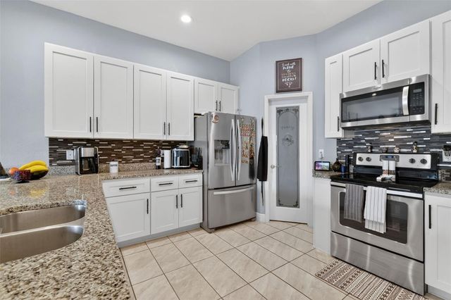 1028 GREEN GATE BOULEVARD, Groveland, FL 34736