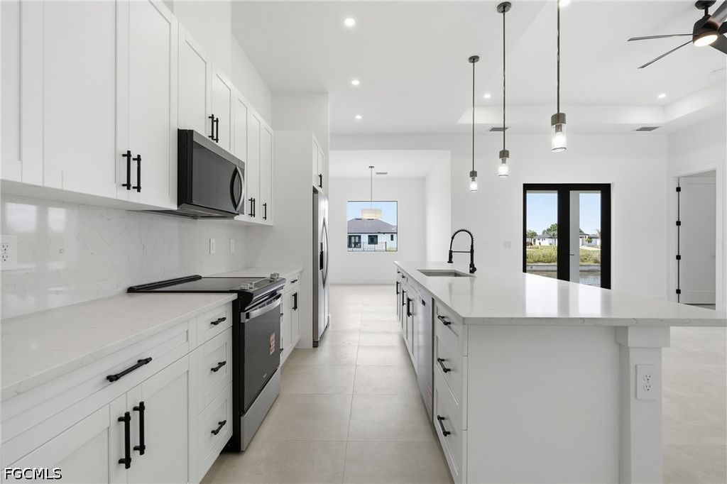 Image 15 of property listing at 343 NE 15th ST, Cape Coral, FL 33909