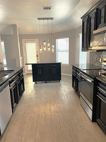12727 Cooper Breaks Drive, Humble, TX 77346